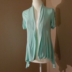 Mint green over camo shirt